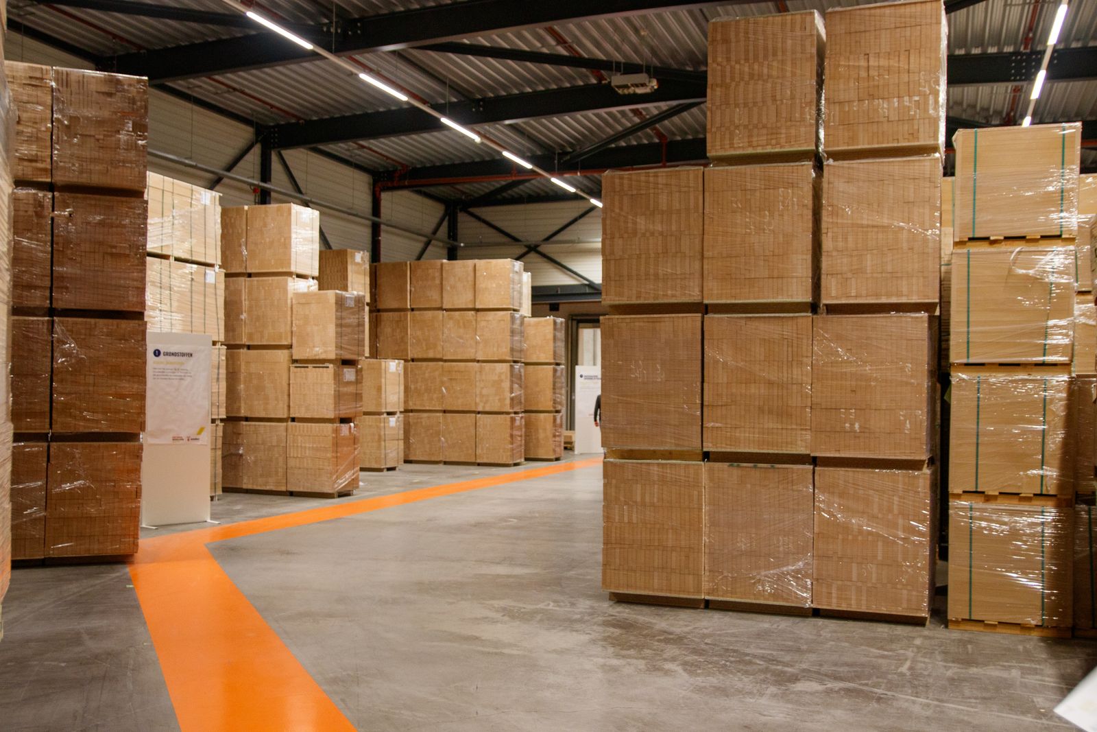 Warehouse with stacked paper packaging materials ready for logistics